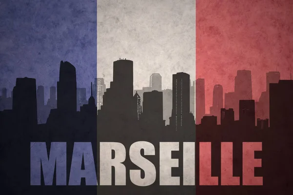 Silhouette abstraite de la ville avec texte Marseille au drapeau français vintage — Photo