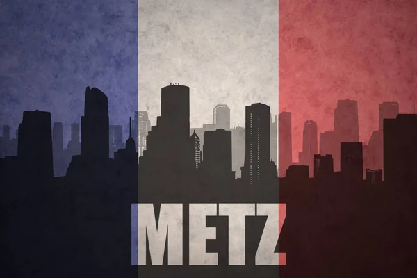 Streszczenie sylwetka miasta z tekstem Metz o vintage flaga francuski — Zdjęcie stockowe