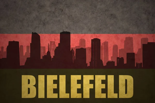 Abstrakte Silhouette der Stadt mit Text bielefeld an der deutschen Fahne — Stockfoto