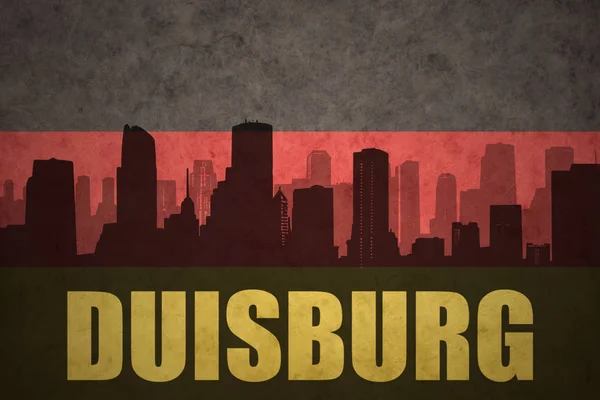 Abstrakte silhouette der stadt mit text duisburg an der deutschen fahne — Stockfoto