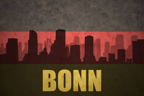 Abstract silhouette of the city with text Bonn at the vintage german flag — Stock Photo, Image