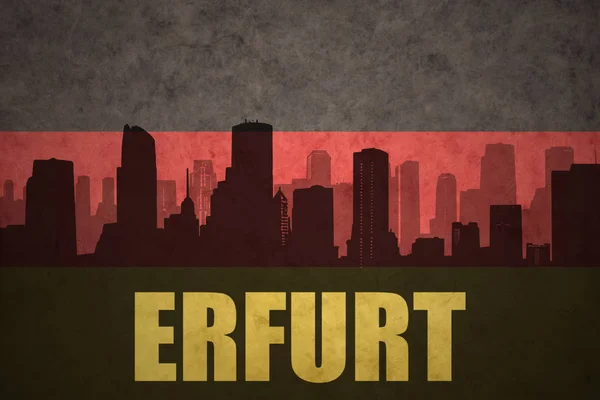 Abstrakte Silhouette der Stadt mit Text erfurt an der deutschen Fahne — Stockfoto