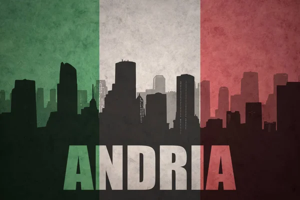 Abstrakt silhuett av byen med tekst Andria ved det italienske vintage-flagget – stockfoto