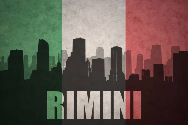 Abstrakte Silhouette der Stadt mit Text rimini auf der italienischen Flagge — Stockfoto