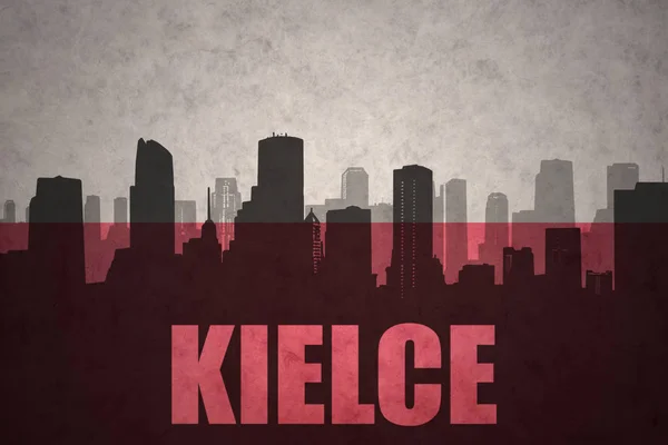 Abstract silhouette of the city with text Kielce at the vintage polish flag — Stock Photo, Image