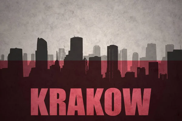 Abstrakta silhuetten av staden med text Krakow på vintage polska flaggan — Stockfoto