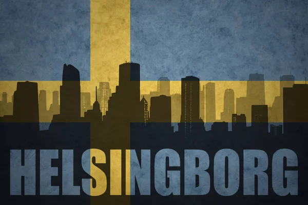 Silueta abstracta de la ciudad con texto Helsingborg en la bandera sueca vintage — Foto de Stock