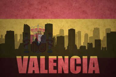 Özet metin Valencia Vintage ile şehir silüeti İspanyolca bayrak