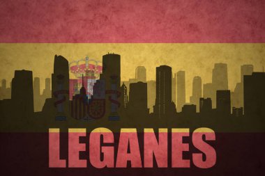 Özet metin Leganes Vintage ile şehir silüeti İspanyolca bayrak