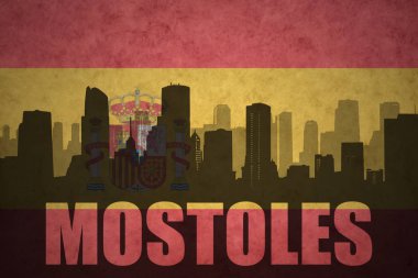Özet metin Mostoles Vintage ile şehir silüeti İspanyolca bayrak