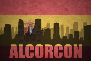 Özet metin Alcorcon Vintage ile şehir silüeti İspanyolca bayrak