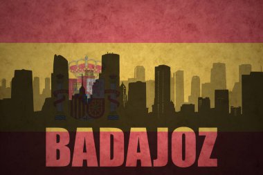 Özet metin Badajoz Vintage ile şehir silüeti İspanyolca bayrak