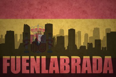Özet metin Fuenlabrada, vintage İspanyol bayrağı ile şehir silüeti