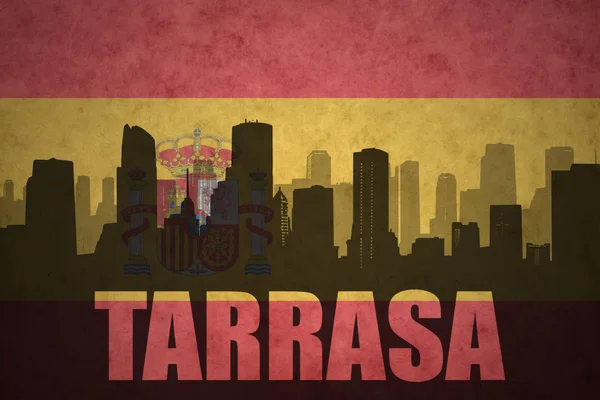 Özet metin Tarrasa Vintage ile şehir silüeti İspanyolca bayrak — Stok fotoğraf
