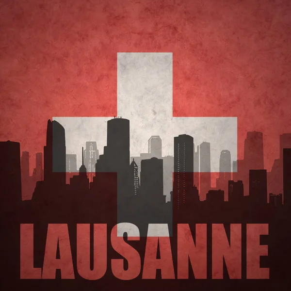 Silueta abstracta de la ciudad con texto Lausana en la bandera suiza vintage — Foto de Stock