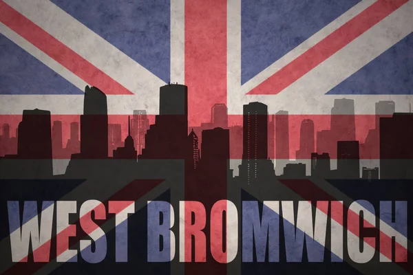 Abstract silhouette of the city with text West Bromwich at the vintage british flag — Stock Photo, Image