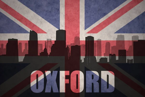 Abstract silhouette of the city with text Oxford at the vintage british flag — Stock Photo, Image