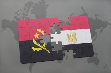 angola ve Mısır ulusal bayrak bir dünya haritası üzerinde ile bulmaca.