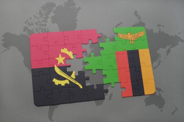 angola ve Zambiya bir dünya haritası üzerinde bayrağı ile bulmaca.