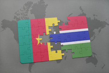 Kamerun ve Gambiya ulusal bayrak bir dünya haritası üzerinde ile bulmaca.