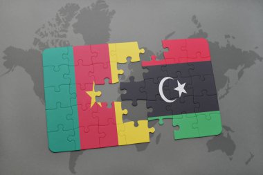 Kamerun ve libya ulusal bayrak bir dünya haritası üzerinde ile bulmaca.