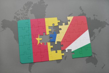 Kamerun ve Seyşeller ulusal bayrak bir dünya haritası üzerinde ile bulmaca.