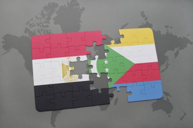 bir dünya haritası üzerinde Mısır ve Komor bayrağı ulusal ile bulmaca.