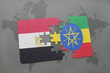 bir dünya haritası üzerinde Mısır ve Etiyopya bayrağı ulusal ile bulmaca.