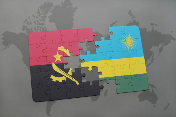 Головоломка з національним прапором Анголи і Руанди на карті світу . — стокове фото