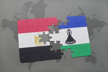 bir dünya haritası üzerinde Mısır ve Lesoto bayrağı ulusal ile bulmaca.