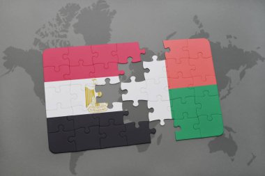 bir dünya haritası üzerinde Mısır ve Madagaskar bayrağı ulusal ile bulmaca.