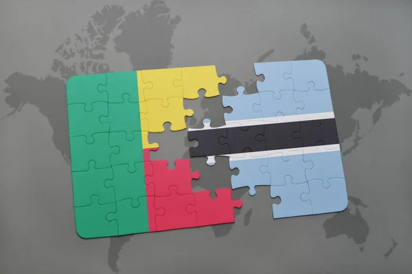 Puzzle con la bandiera nazionale del Benin e del Botswana su una mappa del mondo — Foto Stock