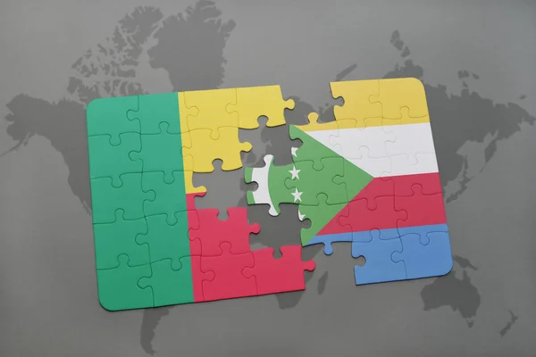 Puzzle avec le drapeau national du Bénin et des Comores sur une carte du monde — Photo