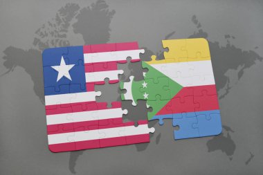 Liberya ve Komor Adaları ulusal bayrak bir dünya haritası üzerinde ile bulmaca