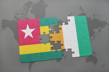 togo ulusal bayrak ile bulmaca ve Fildişi Sahili bir dünya haritası üzerinde