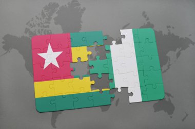 Nijerya ve togo ulusal bayrak bir dünya haritası üzerinde ile bulmaca