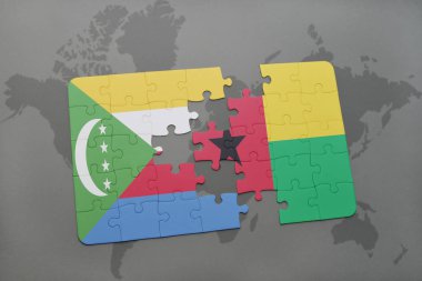 Bulmaca ile Komor Adaları ve Gine bayrağı bissau bir dünya haritası üzerinde