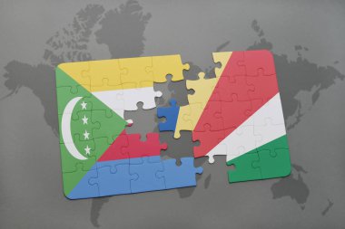 Komor Adaları ve Seyşeller ulusal bayrak bir dünya haritası üzerinde ile bulmaca