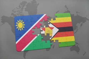 Namibya ve zimbabwe ulusal bayrak bir dünya haritası üzerinde ile bulmaca