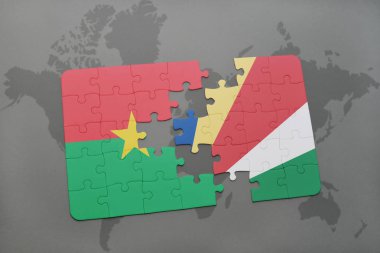 burkina faso ve Seyşeller ulusal bayrak bir dünya haritası üzerinde ile bulmaca
