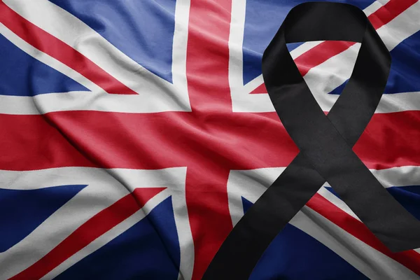 Flag of great britain with black mourning ribbon — Stock Photo, Image