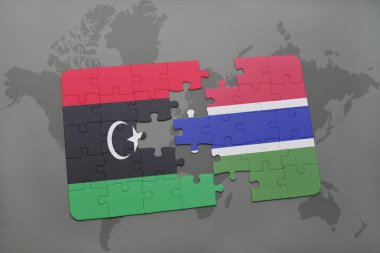 libya ve Gambiya ulusal bayrak bir dünya haritası üzerinde ile bulmaca