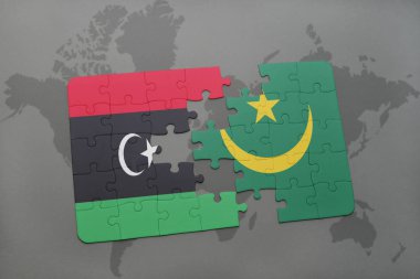 libya ve Moritanya ulusal bayrak bir dünya haritası üzerinde ile bulmaca