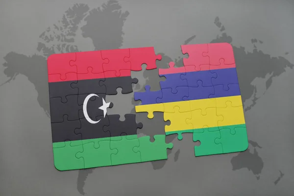 Rompecabezas con la bandera nacional de libya y mauritius en un mapa del mundo —  Fotos de Stock