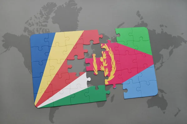 Puzzel met de nationale vlag van de Seychellen en eritrea op een wereldkaart — Stockfoto