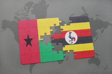 Gine bissau ve uganda ulusal bayrak bir dünya haritası üzerinde ile bulmaca