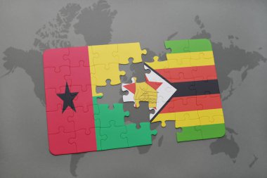 Gine bissau ve Zimbabve Ulusal bayrak bir dünya haritası üzerinde ile bulmaca