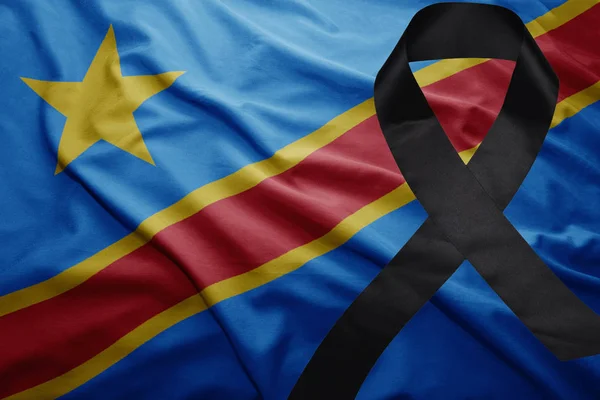 Flag of democratic republic of the congo with black mourning ribbon — Stock Photo, Image
