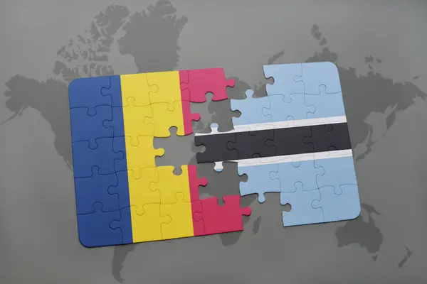 Puzzle avec le drapeau national du Tchad et du Botswana sur une carte du monde — Photo