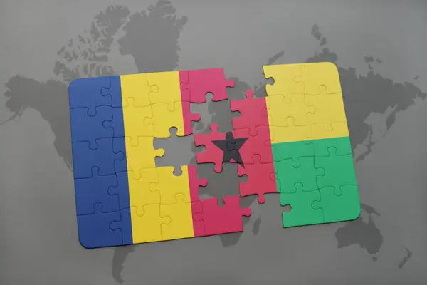 Puzzel met de nationale vlag van Tsjaad en Guinee bissau op een wereldkaart — Stockfoto